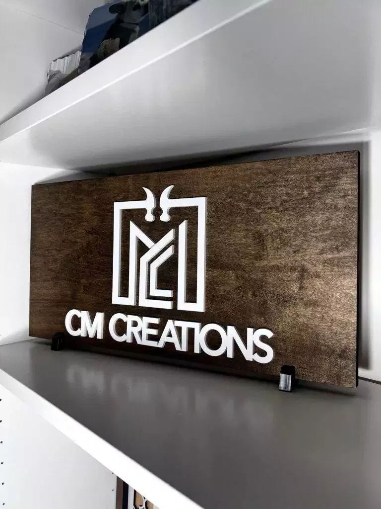 Custom Wood Sign With Raised 3D Acrylic Letters Installed On A Wall