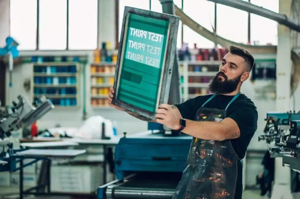 Screen Printed T-Shirts And Apparel Looking At Screen