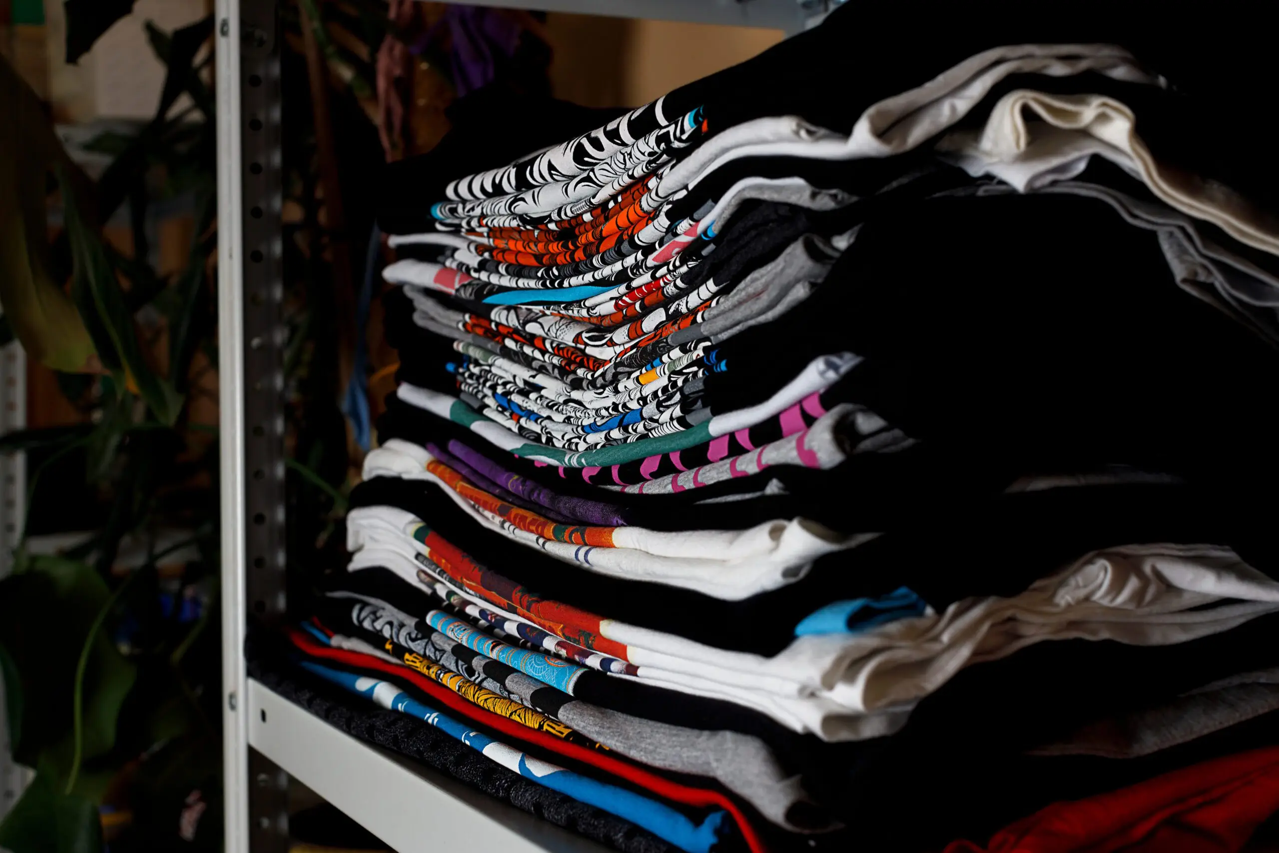 Stack Of Shirts Scaled Stack Of Shirts Scaled